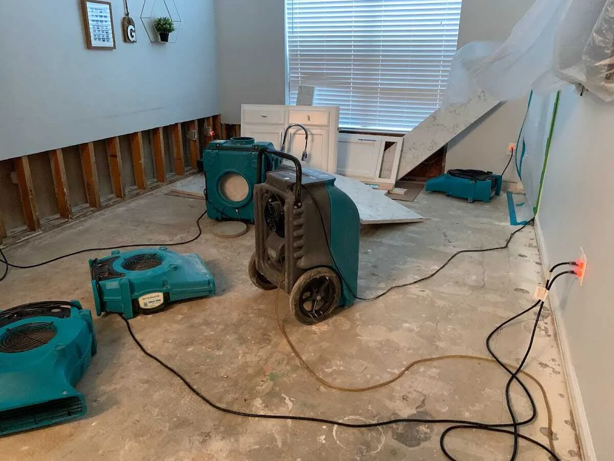 Dehumidifier in flood-cut room for Water Damage Restoration in Wilkins